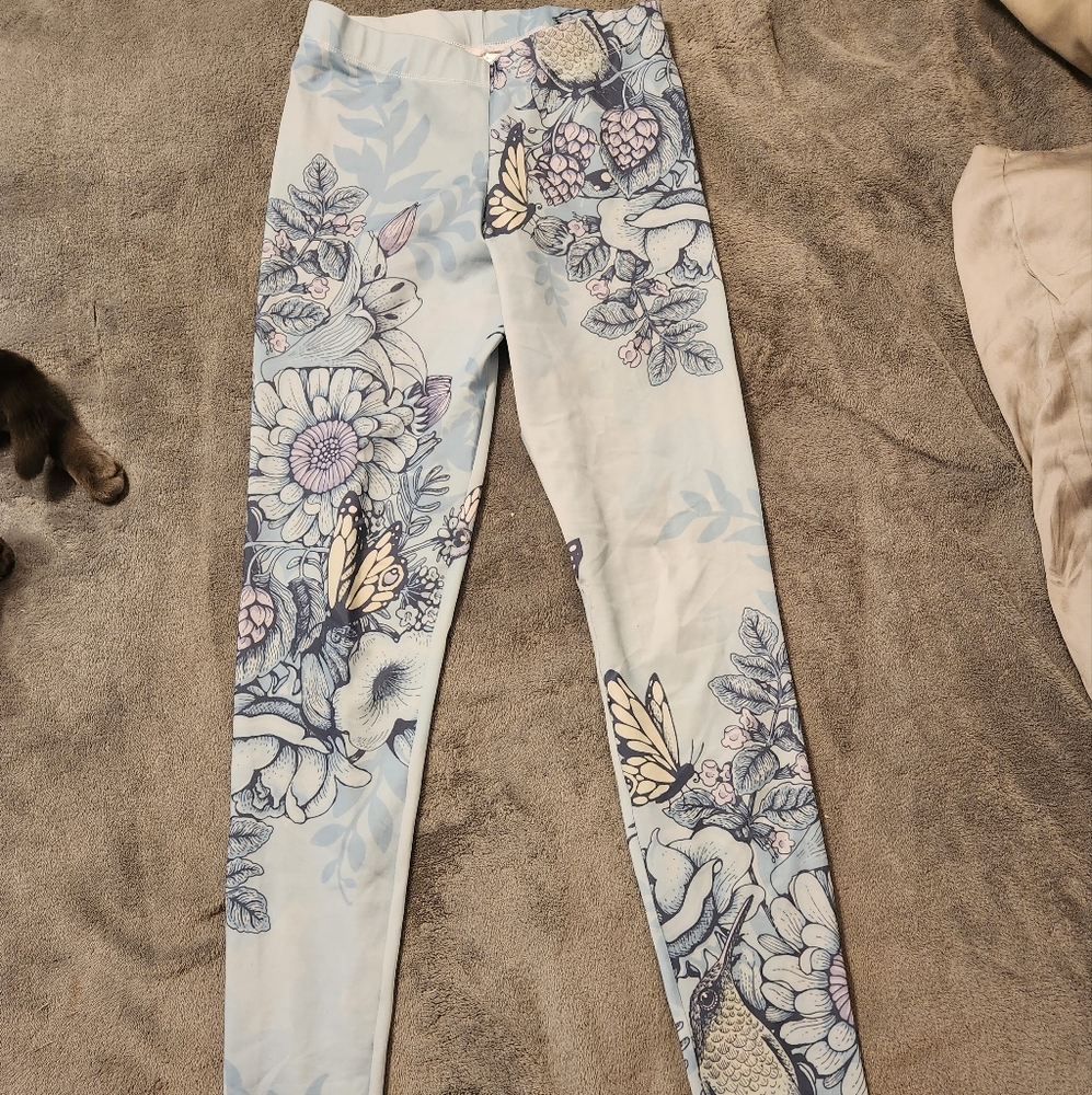 Stretchy blue butterfly and flower print pants